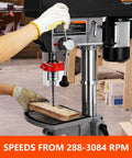 Heavy Duty 15 Inch Floor Drill Press With Rock Solid 7.5 Amp Pure Copper Motor And Slick Variable Speed Up To 3084 RPM in use, drilling wood.