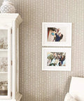 Dew Drops XL Wall Stencil 24 X 39.5 In For Large Geometric Wall Patterns in living room with framed pictures and cabinet