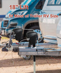 Front view of electric trailer jack on an A-frame trailer tongue, black housing, 18-inch lift, 12V DC.