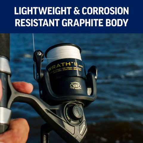 Angler holding Wrath II Saltwater Spinning Reel 3000 Size with corrosion-resistant graphite body by water.