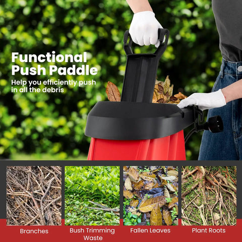 Person using functional push paddle on Powerful 15 Amp Corded Wood Chipper Shredder With 15 To 1 Reduction for yard debris