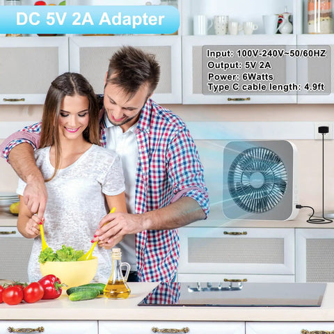 Couple cooking with 10 Inch Box Fan With 3 Speeds And 8 Hour Timer Quiet Square Window Fan in kitchen, wall mounted.