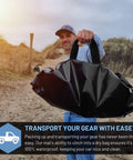 Man holding 32 Inch Wetsuit Changing Mat Bag With Shoulder Strap Waterproof Wet Suit Carrier Keeps Your Car Clean And Gear Dry.