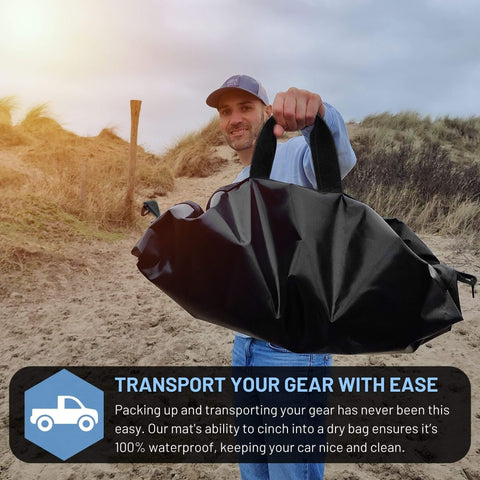 Man holding 32 Inch Wetsuit Changing Mat Bag With Shoulder Strap Waterproof Wet Suit Carrier Keeps Your Car Clean And Gear Dry.