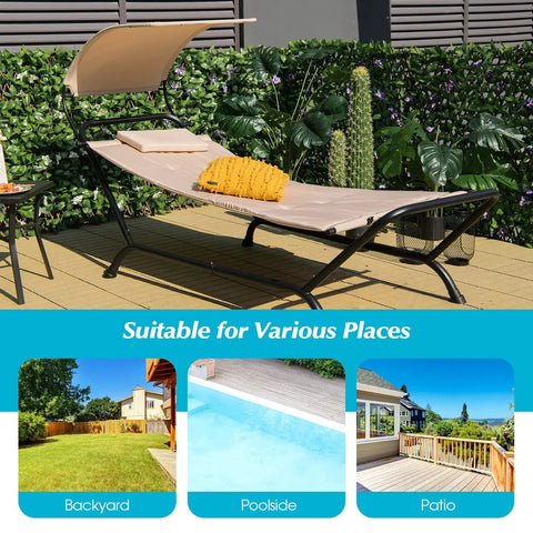 Beige hanging hammock chair with stand and canopy for patio chillin, cushions included, on wooden deck by backyard garden.