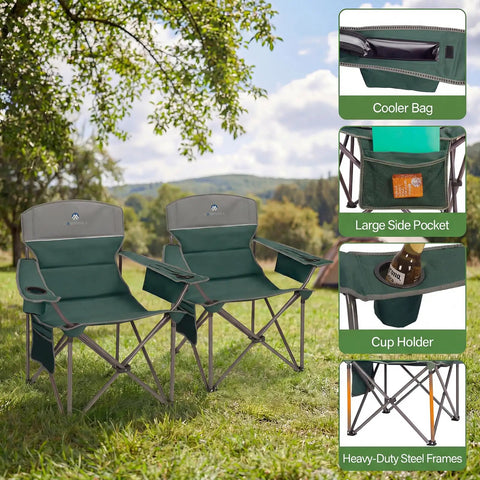 Two dark green oversized camping chairs on grass, with cooler bag, cup holder, side pocket. Heavy-duty steel frames visible.