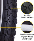 Close-up of 26 inch white wall bicycle tire for beach cruiser showcasing knobby tread pattern and stylish sidewall.