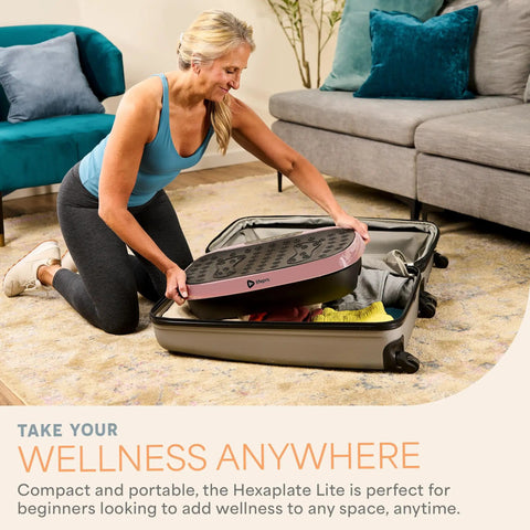 Woman packing HexaPlate Lite Vibration Plate For Full Body Toning And Recovery With Lymphatic Drainage Compact Vibe Platform into suitcase