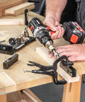 Pocket Hole Jig Face Clamp With Adjustable Pressure And Quick Release Lever securing two wood pieces on a workbench