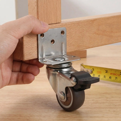 Installing 4 Pack 1.5 Inch Side Mount Casters For Bed And Stroller Heavy Duty TPR Wheels With Locking Brakes on wooden furniture