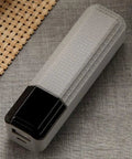 Rock Solid Solder Free 18650 Single Cell Case With Fast Charge Usb Input in a compact design on a textured surface.