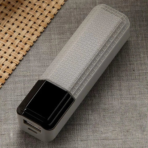 Rock Solid Solder Free 18650 Single Cell Case With Fast Charge Usb Input in a compact design on a textured surface.