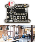 Three Phase Brushless DC Motor Driver Board With DRV8313 For FOC Control on table, compact design, shown in an office setting.