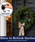 Heavy Duty Vacuum Suction Cup Hooks Black 2 Pack For Smooth Walls And Glass Zero Drama Mounting holding a wreath on a door.