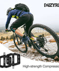 Cyclist riding with Rugged Nylon Fiber Mountain Bike Pedals With Nine Sixteen Inch Spindle, Three Sealed Bearings on trail