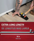 Maverick Wide Angle Pull Bar with 16 in reach for flooring installations demonstrating use in tight gap area with mallet.