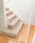 Extra Wide Baby Gate With Door Kid Safe For Stairs And Hallways Hardware Mounted installed at bottom of stairs