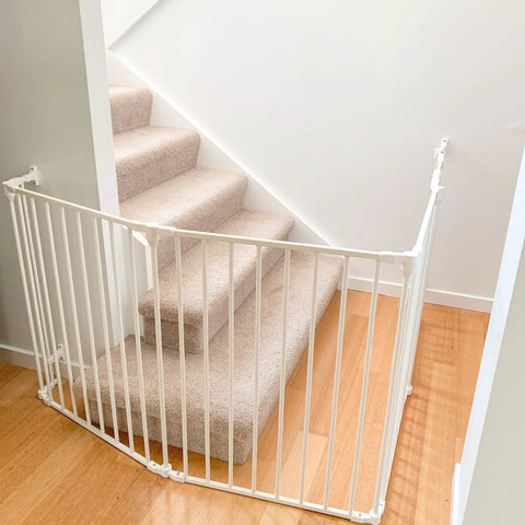 Extra Wide Baby Gate With Door Kid Safe For Stairs And Hallways Hardware Mounted installed at bottom of stairs