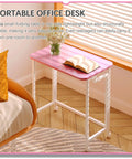 Mobile Folding Laptop Cart On Wheels For Small Spaces 23.6 Inch Rolling Computer Desk In Pink And White next to couch
