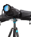 All Weather Pro Camera Rain Cover For DSLR And Mirrorless Cameras With Lens Protection on tripod, showing lens opening