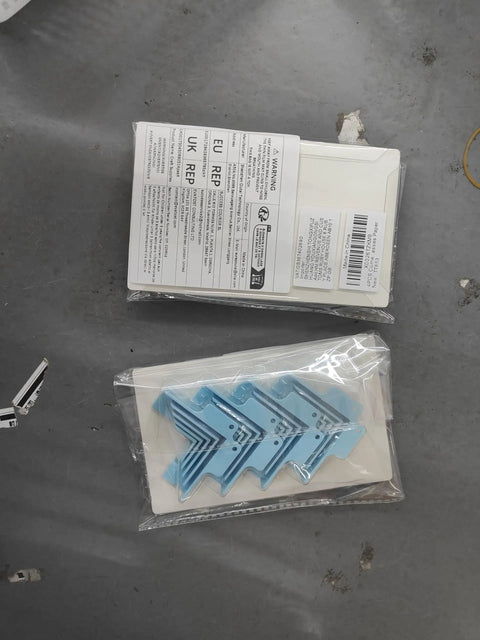Tough As Nails Corner Guides And 5 In 1 Book Cover Tool For Chipboard Boxes and Binding Work, blue plastic corner clips in packaging.