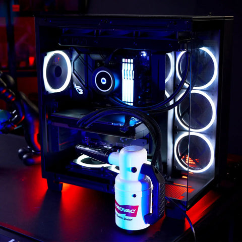 Powerful Computer Duster and Cleaner for Electronics and Home Use, High Velocity Air Blower next to illuminated PC case