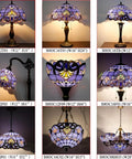 Collection of blue purple baroque stained glass lamps with antique bronze bases, various shapes and sizes, displayed front view.