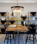 Dining room with Bold Black Drum Polygon Crystal Chandelier, 4 Light Modern Ceiling Fixture With Sleek Matte Black Finish over table