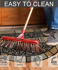 Heavy Duty Entrance Door Mat 24 By 36 Inch Large Entryway Doormat Non Slip Rubber Back Low Profile For Front Porch Garage Patio High Traffic Outdoors Welcome Mat being swept clean