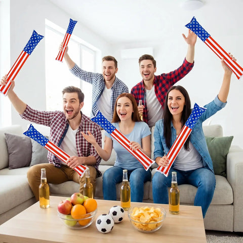 Group holding 120 Pcs Inflatable Thunder Sticks for Parties and Games Red White and Blue USA Flag Boom Sticks in living room