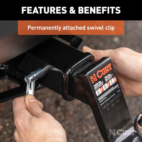 Person attaching a Swivel Trailer Hitch Pin With Integrated Clip Five Eighths Inch Diameter Fits Two Inch Receiver Chrome Finish No Clip Needed For Quick, Secure Trailer Hitch Accessory