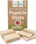 Totally Splinter Free Popsicle Sticks Bulk Pack Of 300 Natural Wood Craft Sticks 4.5 Inches Long in a boxed packaging with neat stacks.