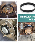 Four Pack Car Wheel Hub Center Rings 73.1 By 60.1 Reduction Adapter on installation scene showing black plastic rings on hub.