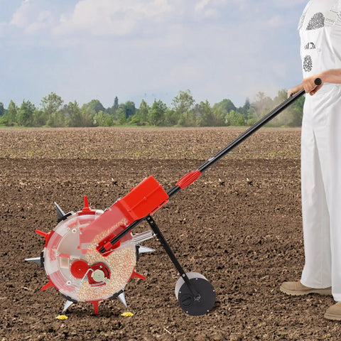 Metal Precision Garden Seeder With 6 Nozzles Walk Behind Row Crop Planter Manual Seeder in use on a farm field