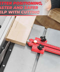 Front view of red Saker thin rip jig table saw guide with ruler scale and two black knobs guiding a narrow wood strip.