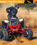 ATV equipped with 4500 Pound 12V DC Waterproof Electric Winch Kit for towing on a muddy trail, showing synthetic rope in use.