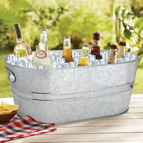 Two Pack 4 Gallon Galvanized Ice Buckets For Parties Portable Beverage Tub filled with ice and assorted drinks outdoors