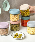 Six Pack 10oz Glass Jars With Airtight Lids For Overnight Oats, Yogurt, Snacks, Spices And Sugar, filled with various foods