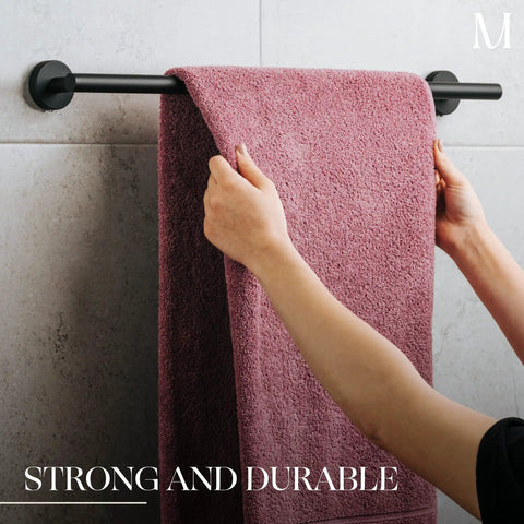 Hands placing towel on Matte Black 24 Inch Towel Bar Rack Heavy Duty Stainless Steel SUS 304 Wall Mounted Bathroom Kitchen Towel Holder