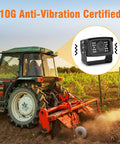 Tractor equipped with 1080P Wired Backup Camera System For Tractors And Heavy Duty Farm Trucks 7 Inch HD Monitor in a field at sunset.