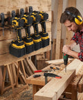 3 Pack Heavy Duty Power Tool Wall Mount Organizer For Cordless Drills And Tools Garage Shop Storage Rack Quick Install Iron Black Finish Holds 4 Tools Per Mount 12 Tools Total Dimensions 16.6 By 6.8 By 1.8 Inches mounted on wooden wall with drills.