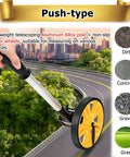 Collapsible Mechanical Distance Measuring Wheel for Construction with yellow wheel on a road, lightweight aluminum alloy pole.