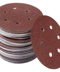 Premium 6 Inch Hook And Loop Sandpaper Discs Set stacked with varied grit sizes for polishing wood, metal, and rubber surfaces.