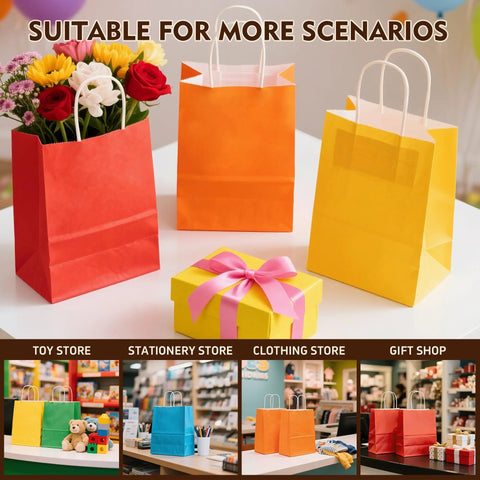 Kraft Gift Bags With Handles Bulk Pack 24 Small Party Favor Bags in 6 Colors, shown with flowers and gift box on table