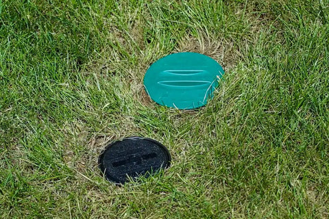 In Ground Impact Sprinkler With Click N Go Hose Connect for quick lawn irrigation installation, visible in grass.