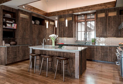 Modern kitchen with wood peel and stick budget friendly dope walnut grain texture wallpaper on cabinets and walls.