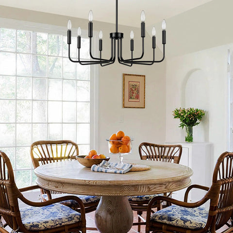 Killer 8 Light Black Chandelier With Dang Sharp Matte Finish For Farmhouse Dining Room And Kitchen Island above a wooden dining table.