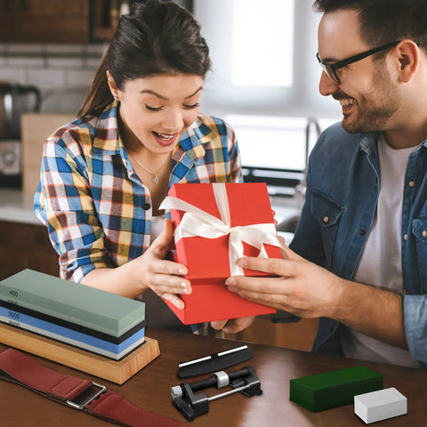 Couple exchanging gift of Quad Sided Whetstone Knife Sharpening Kit With 400 1000 And 3000 8000 Grits Wet Stone Sharpener