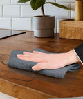 Person cleaning wooden countertop with gray 14x17 inch bar towel from Pack Of 60 14 By 17 Inch Bar Towels For Cleaning 100 Percent Cotton Absorbent And Reusable Multipurpose Terry Cloth Shop Rags Gray Great For Heavy Duty Cleaning Spills And Damp Surfaces In Home Garage And Workshop