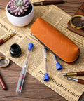 6 Pack Fountain Pen Ink Syringe Fillers With Storage Tube Spring Converter Refill Tool on desk with accessories